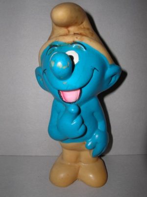 I Puffi - Smurfette, Pappa Puffo e cervelloni giocattoli isolato